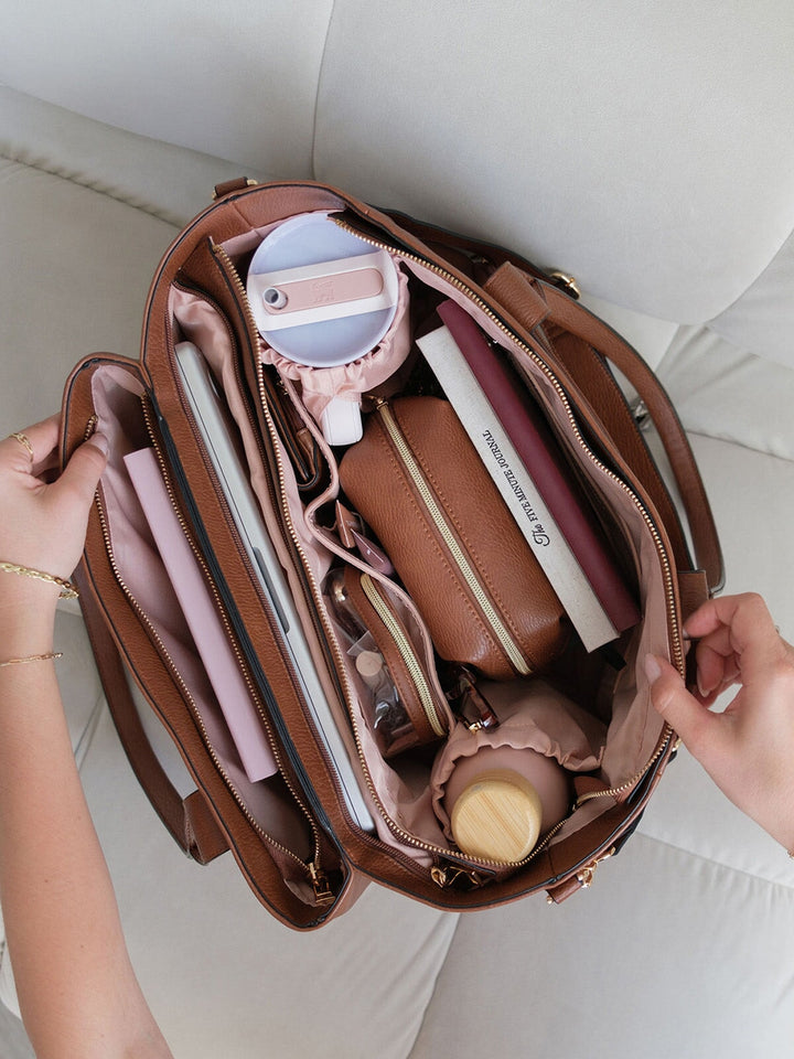 Overhead view of the Poppy & Peonies Double Duty Tote in Chestnut packed with everyday essentials and organized interior compartments.