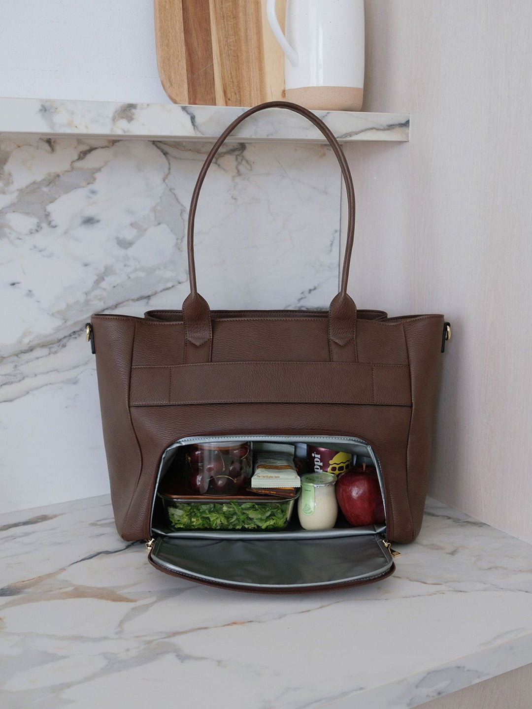 Poppy & Peonies Double Duty Tote in Espresso showcasing the insulated lunch compartment with lunch and snacks.