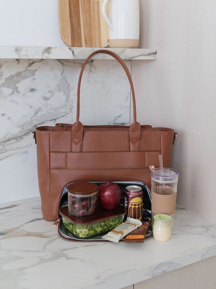 Poppy & Peonies Double Duty Tote in Chestnut styled with lunch, snacks and iced coffee, showcasing everyday carry capacity.