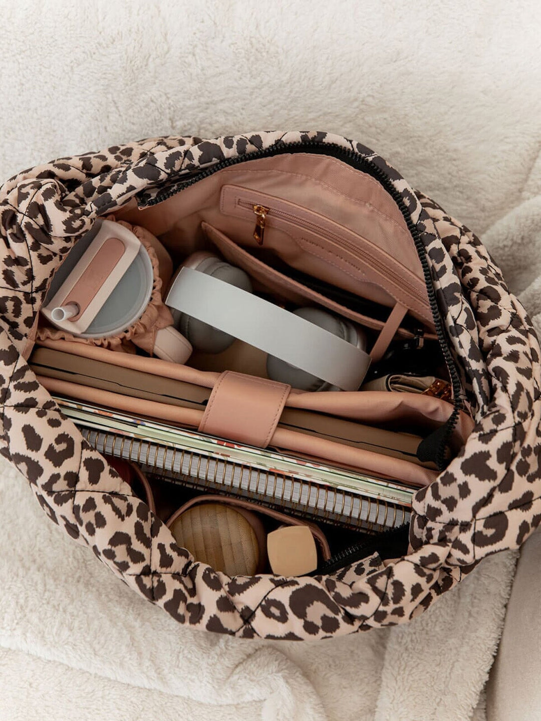 Interior of a leopard print quilted hobo bag