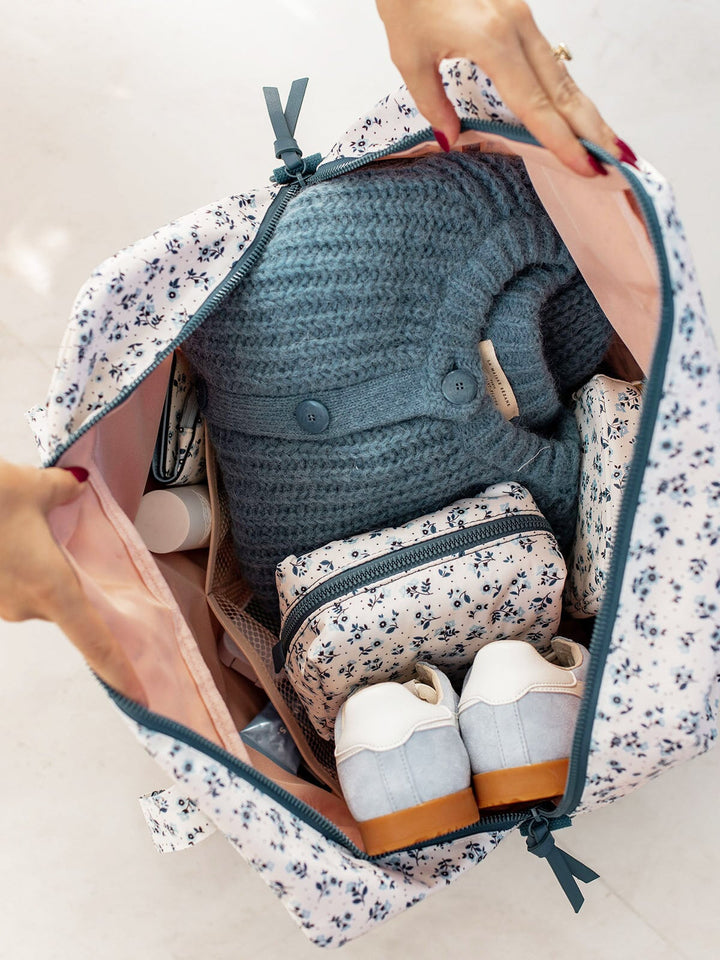 The Pack Up Duffle Blue Floral